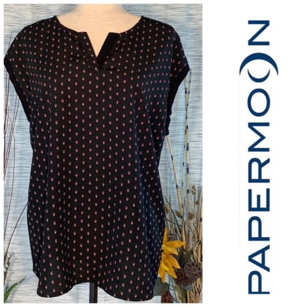 Papermoon black w/ small designs on front of a sleeveless blouse.